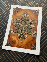 Image 1 of A5 size coffee stain mandala on watercolour paper 