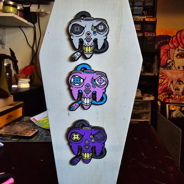 Image of Skulltendo Sixty-Four 2" enamel pin