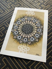 Image 1 of A5 size negative stencilled mandala on watercolour paper 