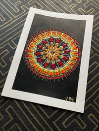 Image 1 of A5 size colourful wheel mandala on watercolour paper