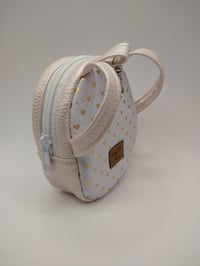 Image 2 of White and gold baby pack