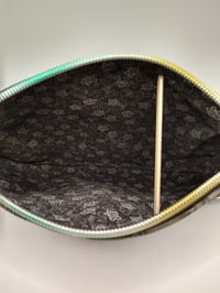 Image 2 of Grey flowered top black bottom wristlet