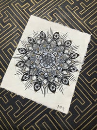 Image 1 of Black and white stencilled mandala on recycled cotton paper 