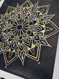 Image 2 of Bronze pigment ink on black background mandala on scrap watercolour paper