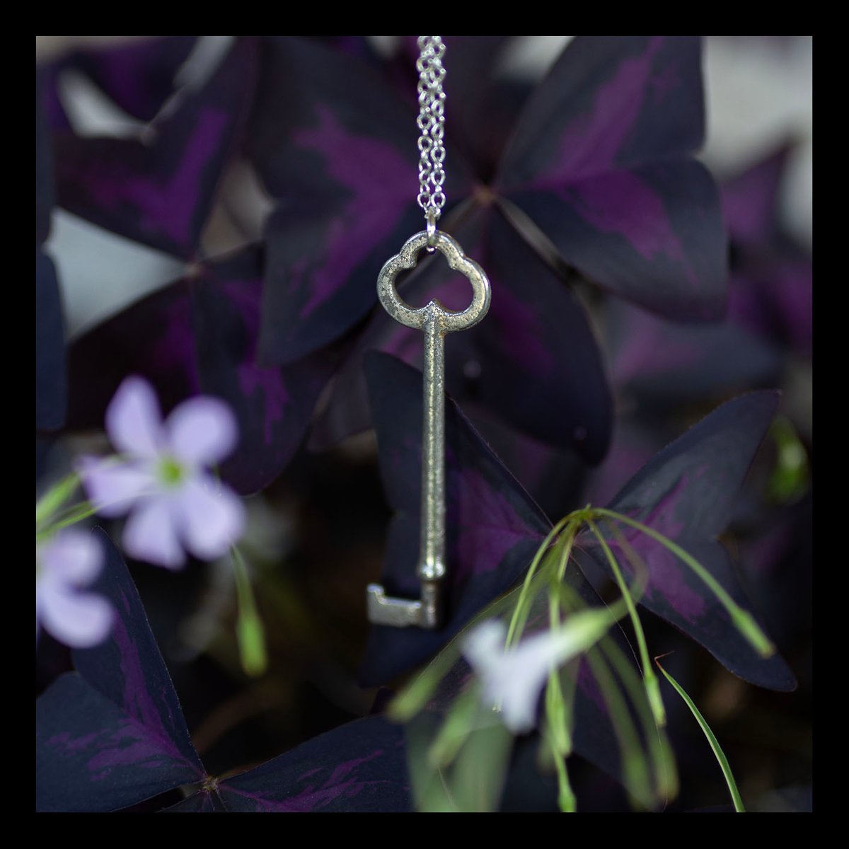 Large silver cloud skeleton key necklace
