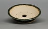 Round bonsai pot in a green layered glaze. D.159mm