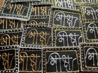 Image 1 of Sanskrit 'Moksha' calligraphy paper stickers 