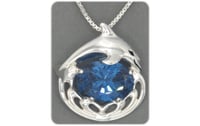 Dolphin Pendant with Faceted Imitation Blue Zircon