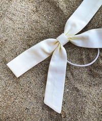Image 1 of BERNADETTE BOW · pastel yellow