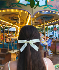 Image 3 of BERNADETTE BOW · pastel yellow