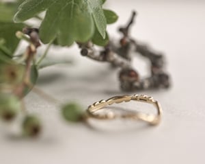 Image of 18ct gold 2mm floral carved wishbone ring