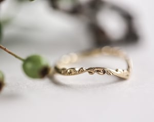 Image of 18ct gold 2mm floral carved wishbone ring