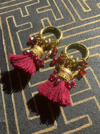 Image 1 of Red Afghan tassel ear weights 