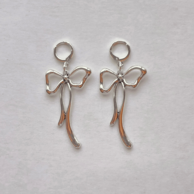 big melting silver bow earrings 