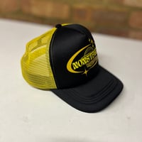 Image 1 of Black/yellow soft-shell trucker