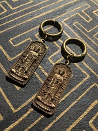 Image 1 of Vintage brass reversible Buddha Mantra ear weights 