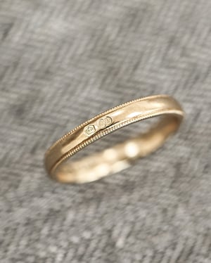 Image of 18ct Yellow gold 3mm milled edge ring