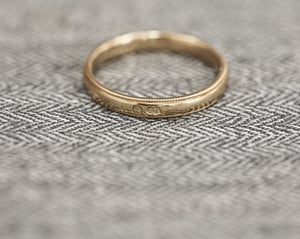 Image of 18ct Yellow gold 3mm milled edge ring