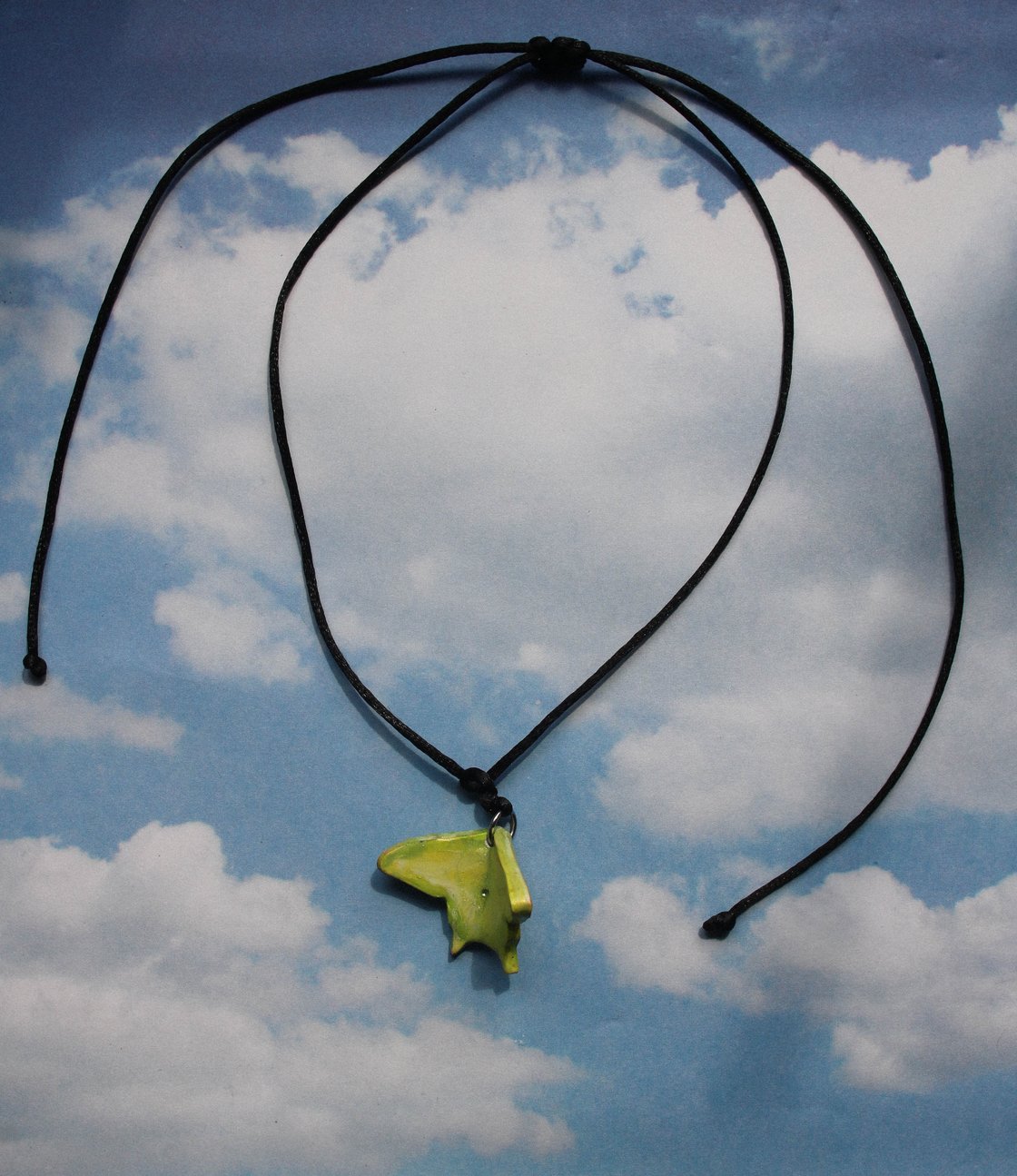 Image of green moth talisman