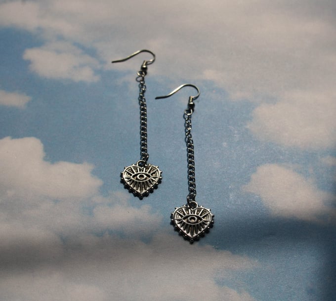 Image of heart eye earrings