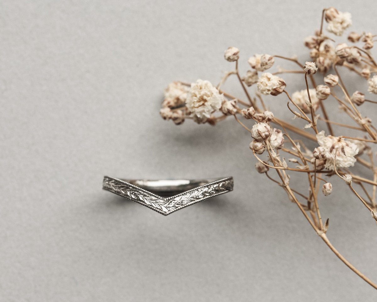 Image of Platinum 2mm flat court laurel leaf and milled edge engraved wishbone ring