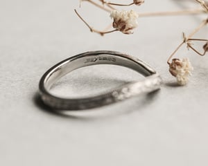 Image of Platinum 2mm flat court laurel leaf and milled edge engraved wishbone ring