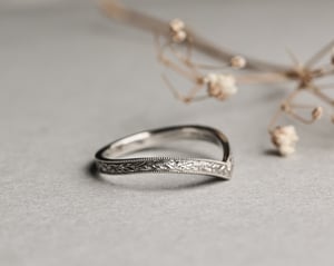 Image of Platinum 2mm flat court laurel leaf and milled edge engraved wishbone ring