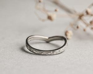 Image of Platinum 2mm flat court laurel leaf and milled edge engraved wishbone ring