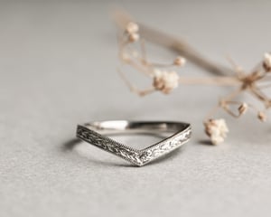 Image of Platinum 2mm flat court laurel leaf and milled edge engraved wishbone ring