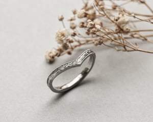 Image of Platinum 2mm flat court laurel leaf and milled edge engraved wishbone ring