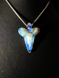 Image 1 of Moonstone & mirage (CFL) shark tooth pendant.