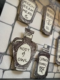 Image 2 of Five paper potions black and red
