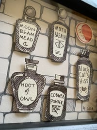 Image 3 of Five paper potions black and red