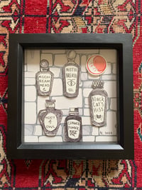Image 1 of Five paper potions black and red