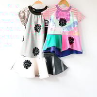 Image 9 of floral black and white pocket sketchy petals 6/7 courtneycourtney short sleeve twirl twirly dress