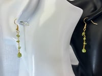 Image 1 of Verdant Whisper Drops | dainty peridot chips gold dangling earrings