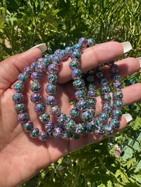 Image 1 of Rainbow Lava Stone 