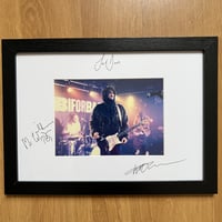 Signed framed photo of Trampolene 