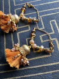 Image 2 of Gold plated Afghan tassel tunnel earrings