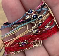 Image 2 of Gold evil eye bracelet