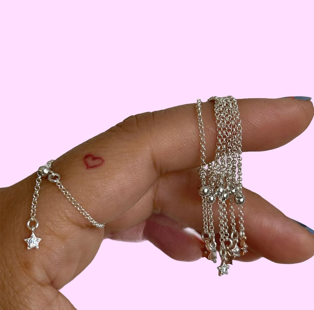 Image of Adjustable chain and star ring