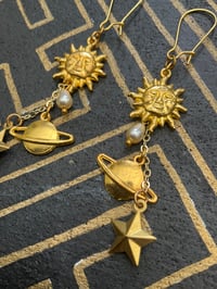 Image 2 of Sun, planet and faux pearl earrings 