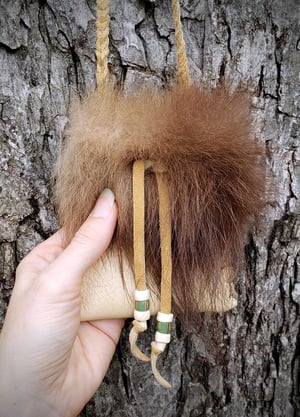 Image of Wolverine and Deerskin Pouch