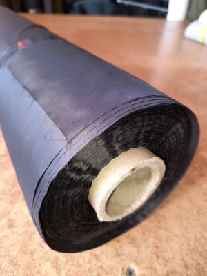 Image of 200 metre roll of black lightweight nylon x 70cm width