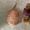 Olive , earthenware mask