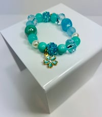 Image 2 of Blue Flower Charm Elastic Bracelet 
