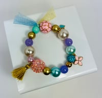 Image 1 of Blue Crown & Gold Tassel Charm Elastic Bracelet 