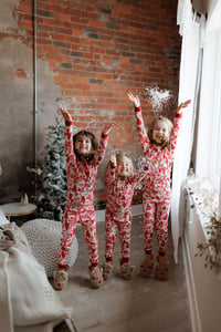 Image 4 of JSP Studio Holiday Petite | Pajamas & Glitter Snow in the studio bedroom + the studio swing