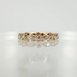 Image of 18ct rose gold celebration style eternity ring. PJ5499a