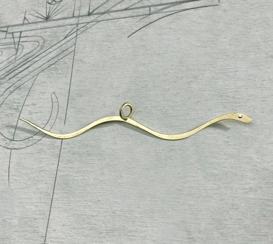 Image of Snake and Ring Pendant